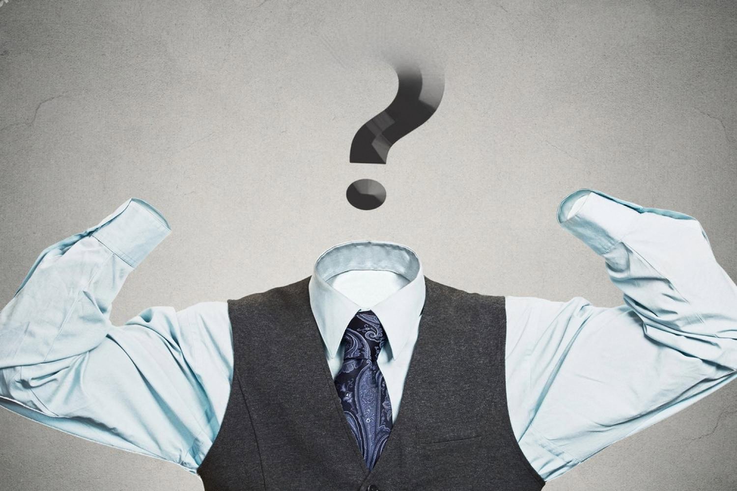 Headless businessman with a question mark, symbolising confusion around money decisions